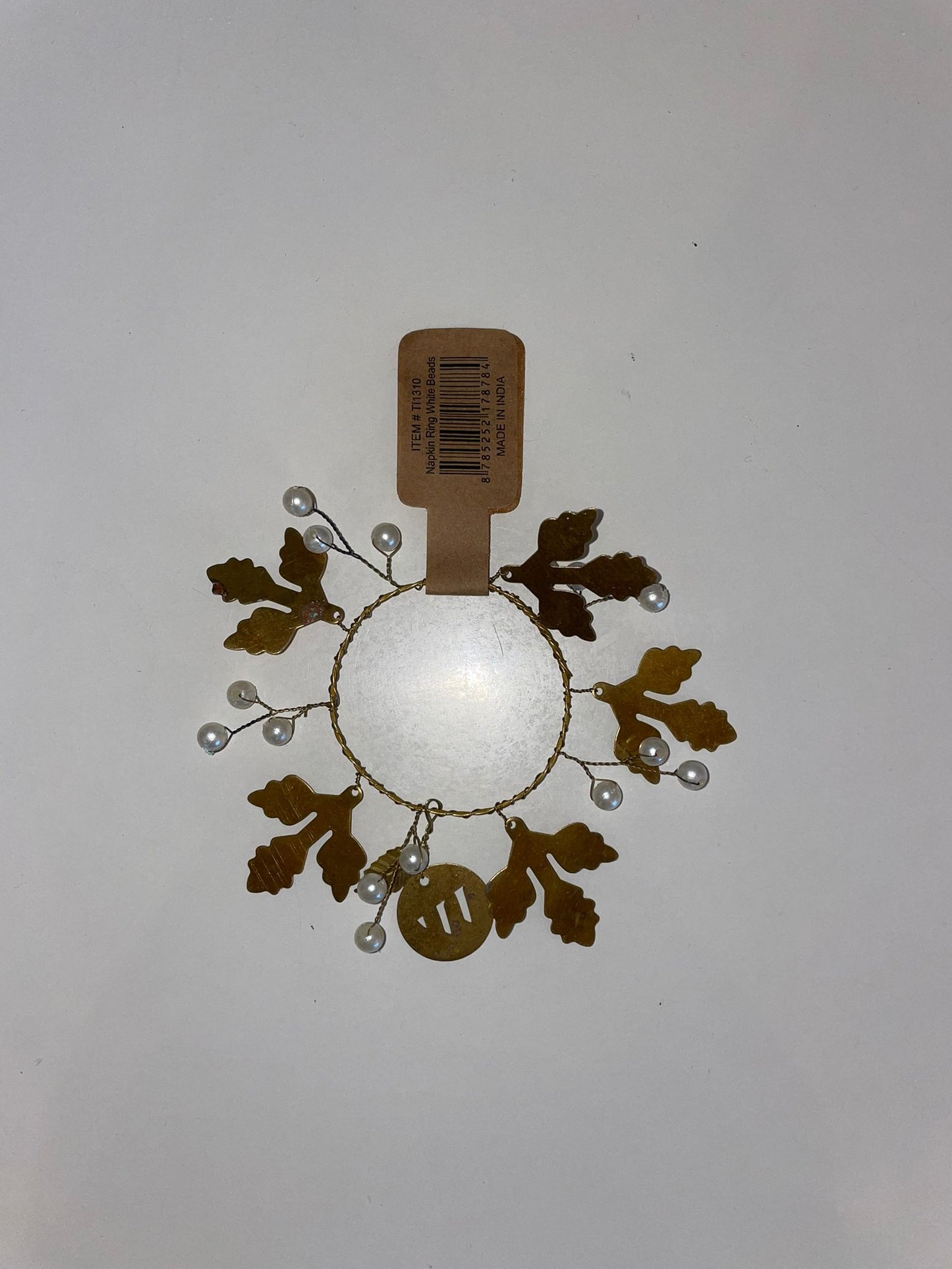 Ronds de serviettes en laiton doré avec des perles et des feuilles