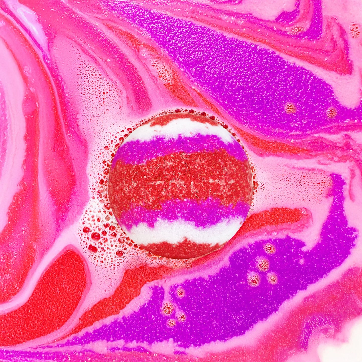 Boule bain effervescente rose, parfumée à la fraise.