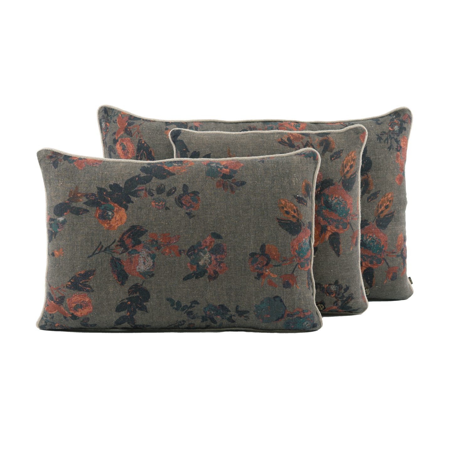Coussin rectangulaire en lin, housse avec imprimé floral dans les tons vert kaki, bleu foncé, orangé.