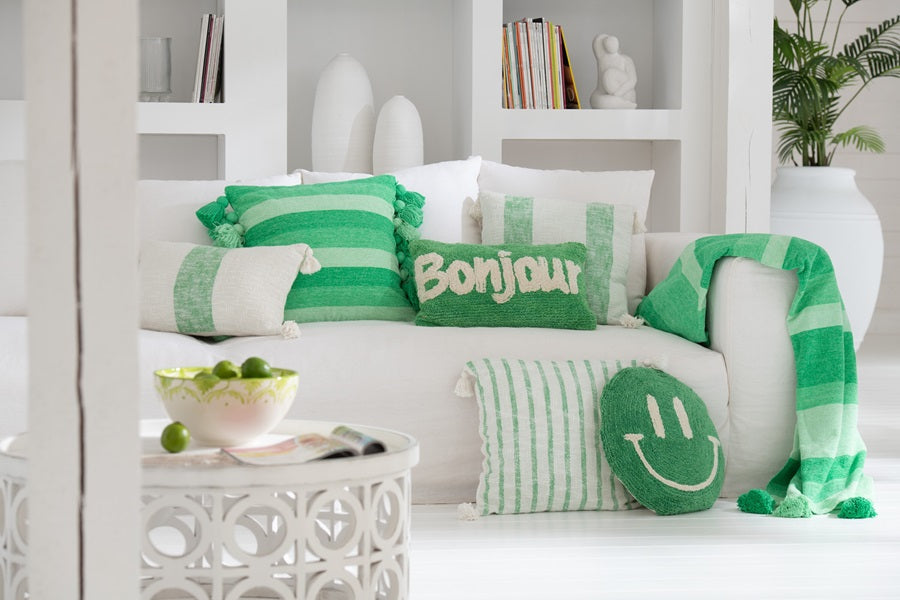 Plaid en coton à rayures et gros pompons vert