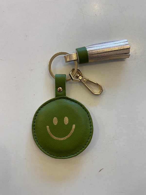 Porte clés en cuir trop funs avec un joli pompon