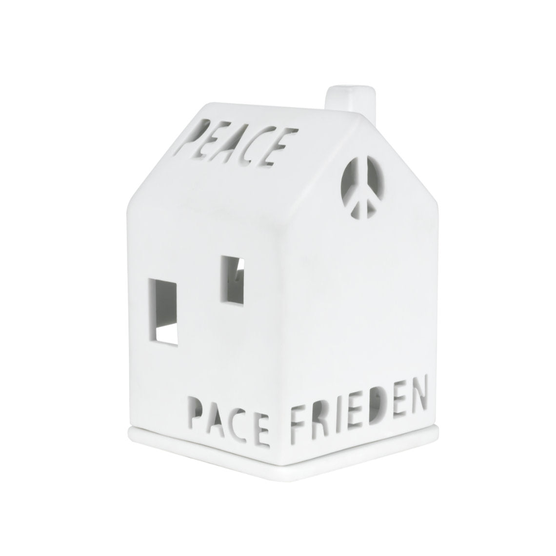 Photophore en porcelaine blanche en forme de maison avec écrit le mot "Paix" en plusieurs langues.