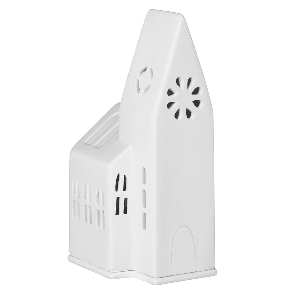 Photophore en porcelaine blanche en forme de petite église, sur fond blanc.