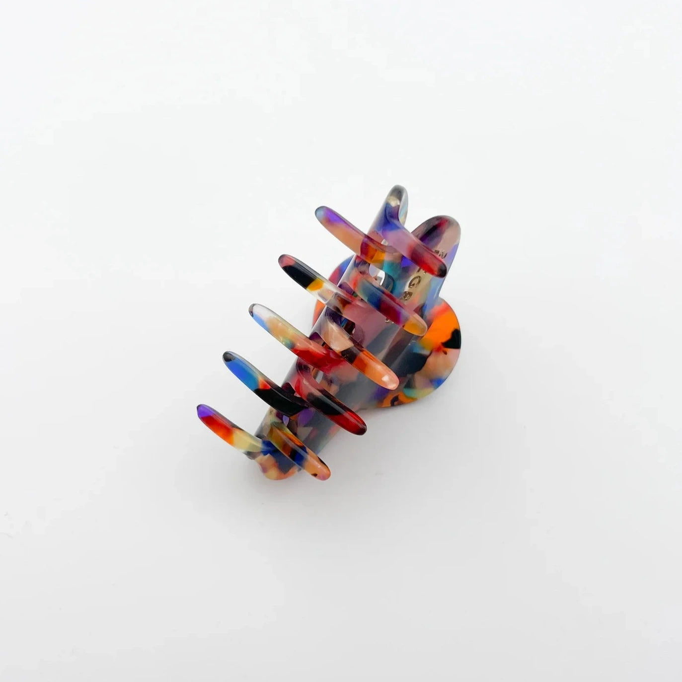 Petite pince à cheveux en forme de nuage à motifs écaille, multicolore.