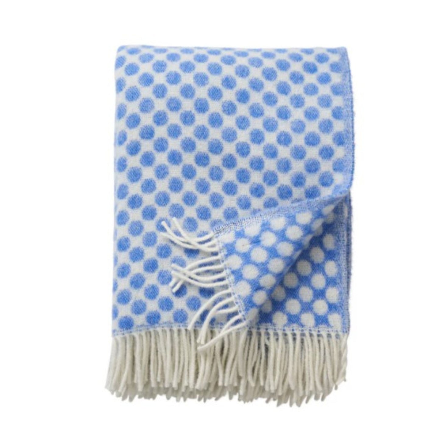 Plaid en laine, motifs à pois bleus et blanc.