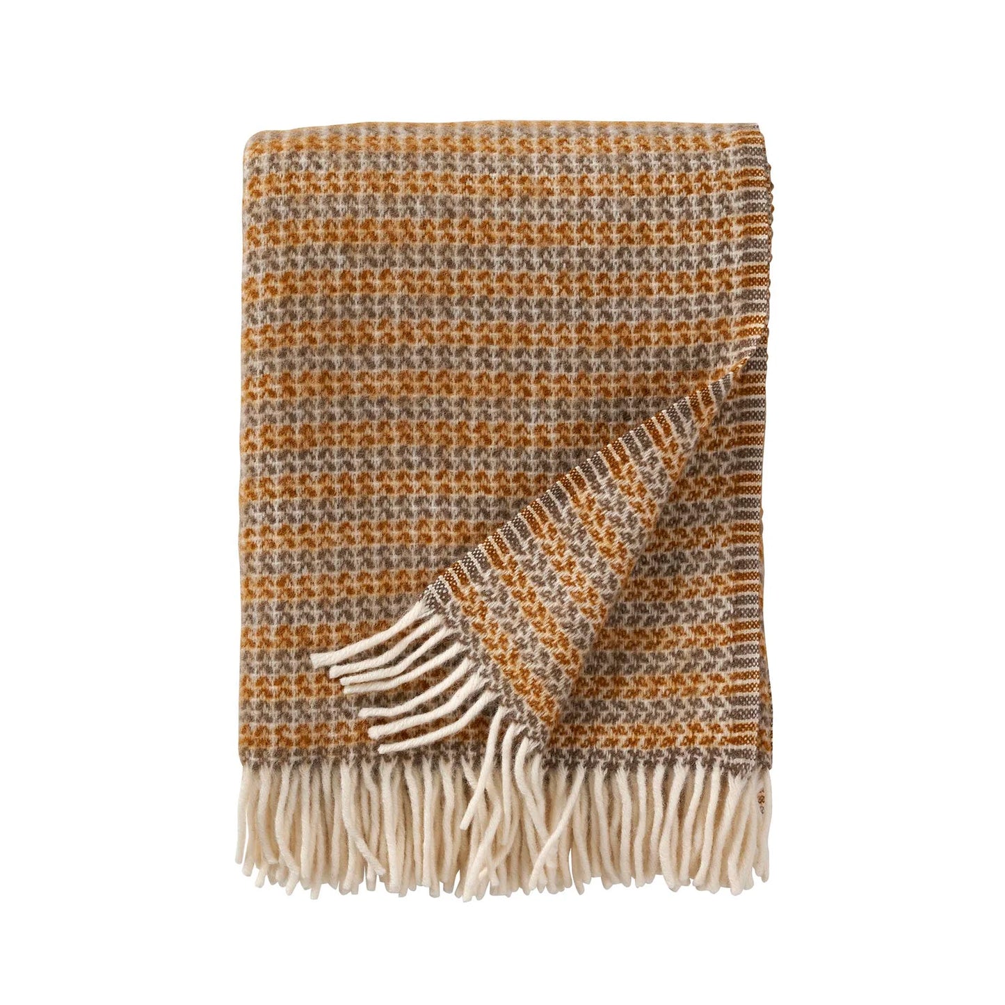 Plaid en laine d'agneau avec des petits motifs courbés dans les tons caramels.