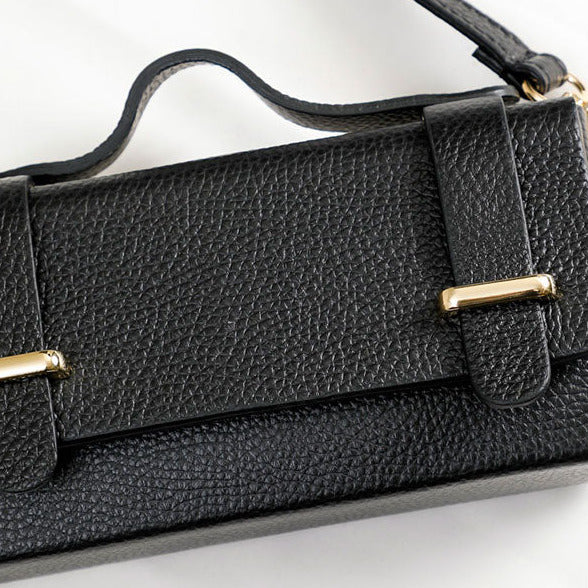 Sac en cuir de vachette grainé, coloris noir.