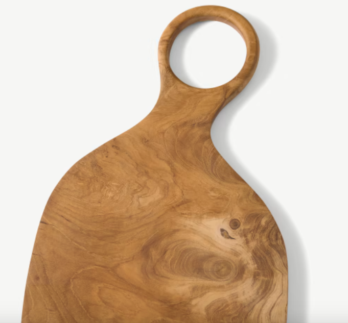 Planche à découper ovale irrégulière en teck avec poignée design