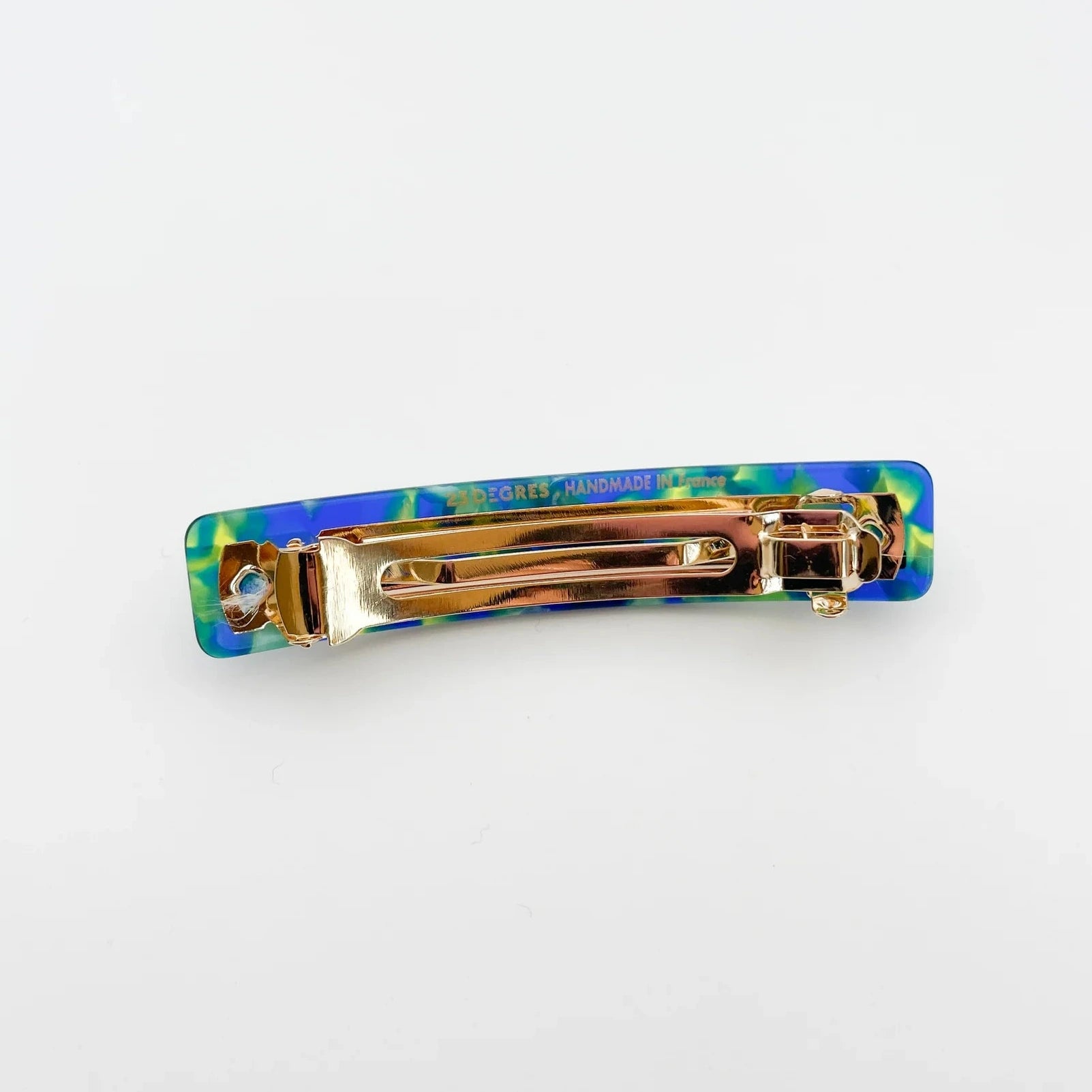 Barrette 9 cm de 23 degrés en acétate, coloris bleu et vert, vue d'en dessous.