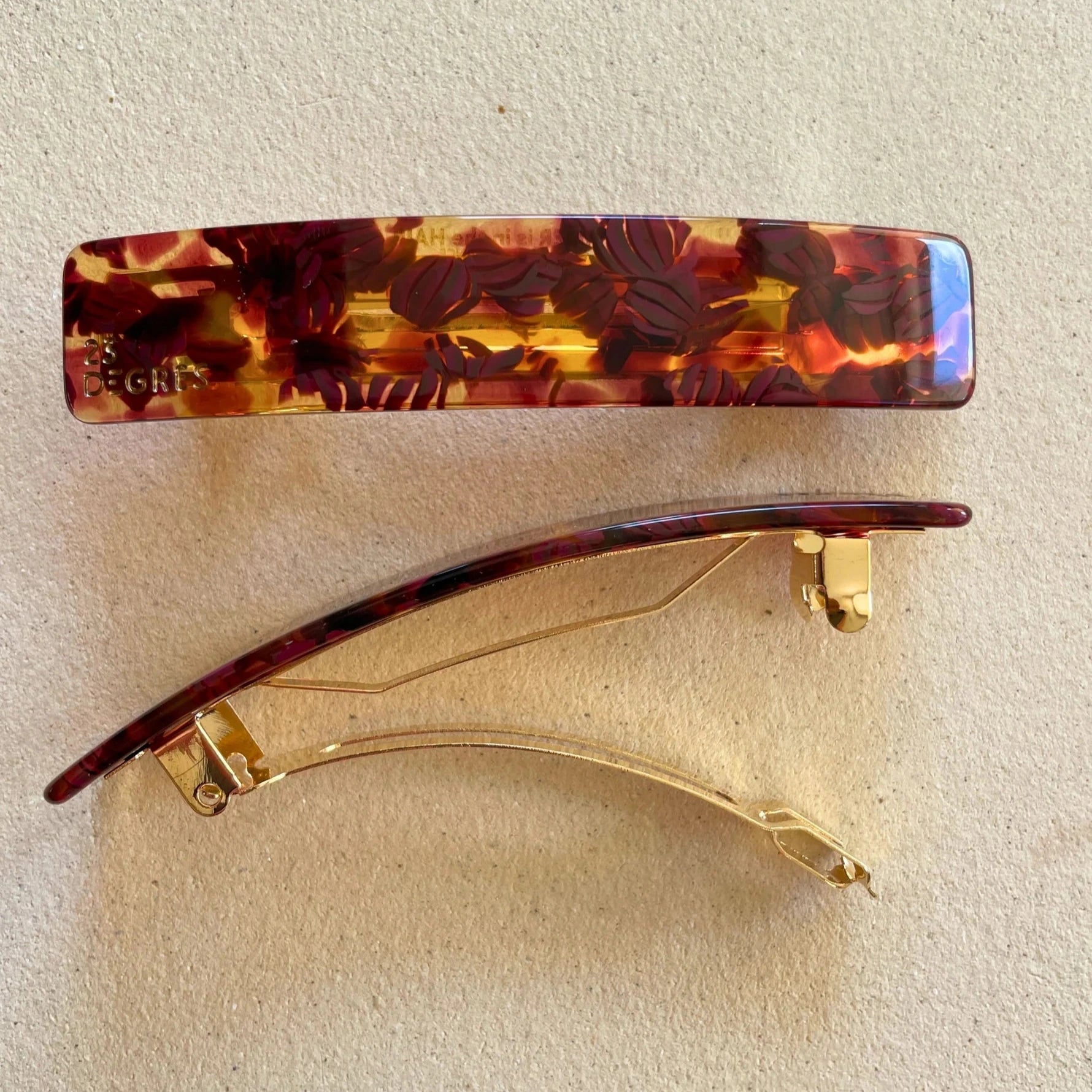 Barrette 9 cm de 23 degrés en acétate, coloris marron à motif grain de café.