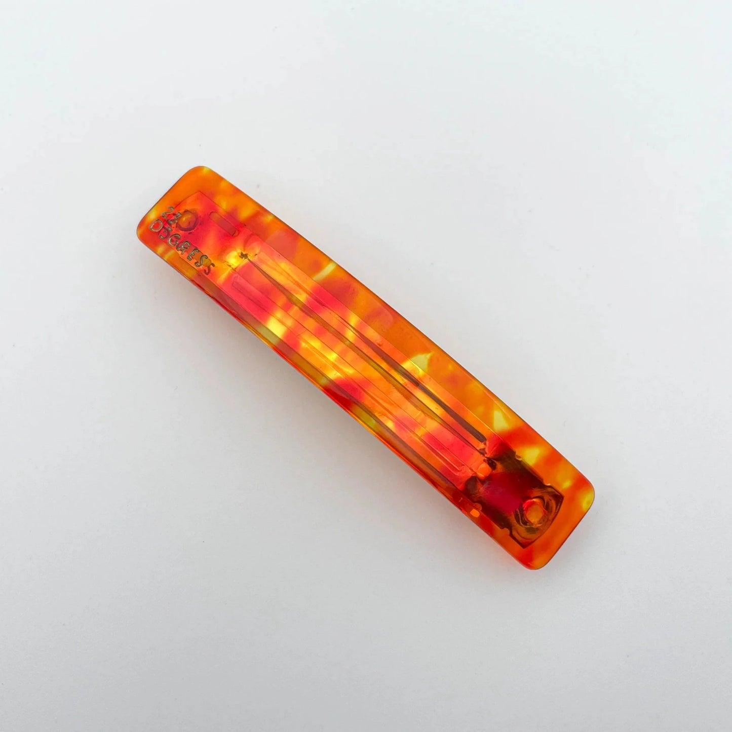 Barrette 9 cm de 23 degrés en acétate, coloris orange. 