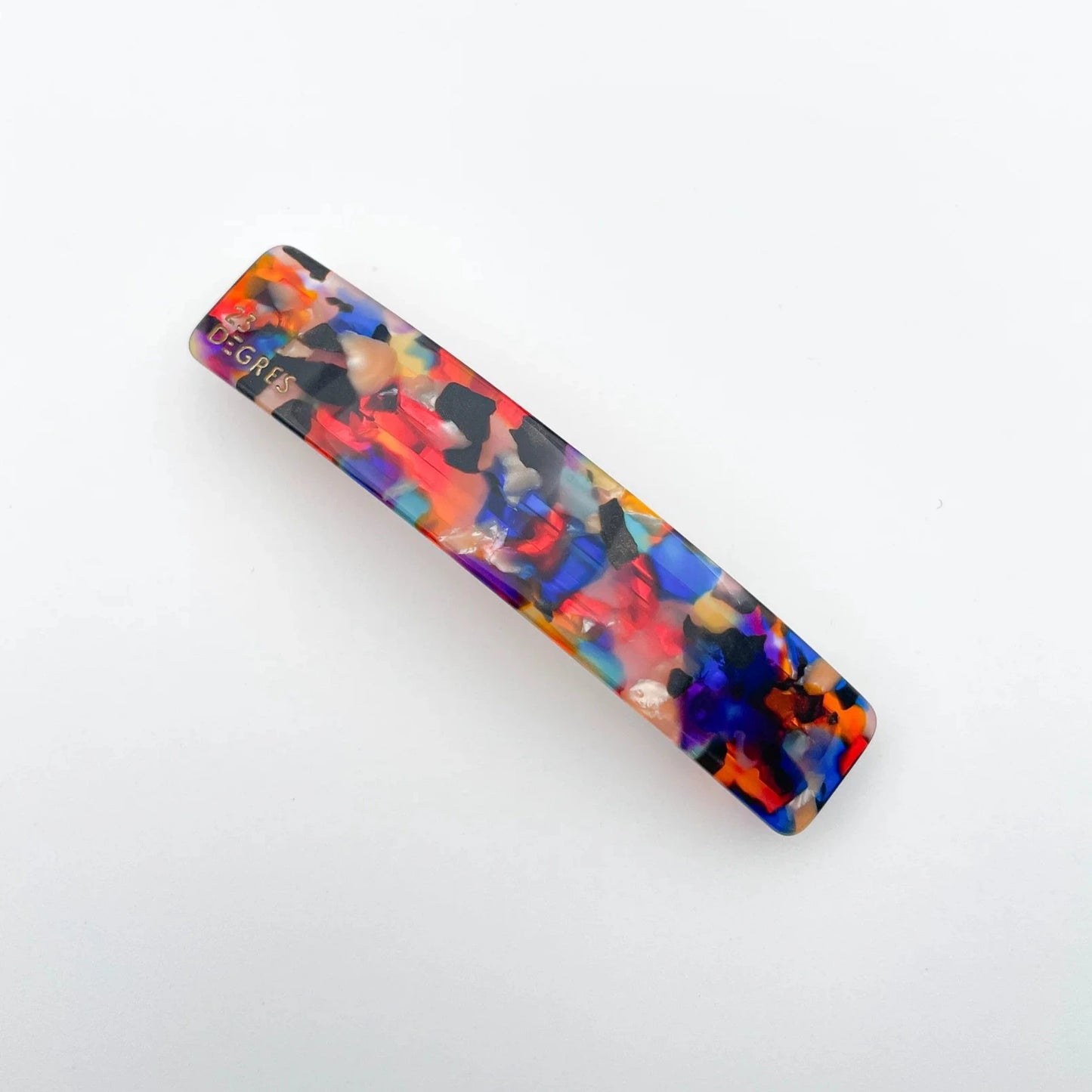 Barrette 9 cm de 23 degrés en acétate, coloris multicolore avec du bleu, du rouge et du noir. 