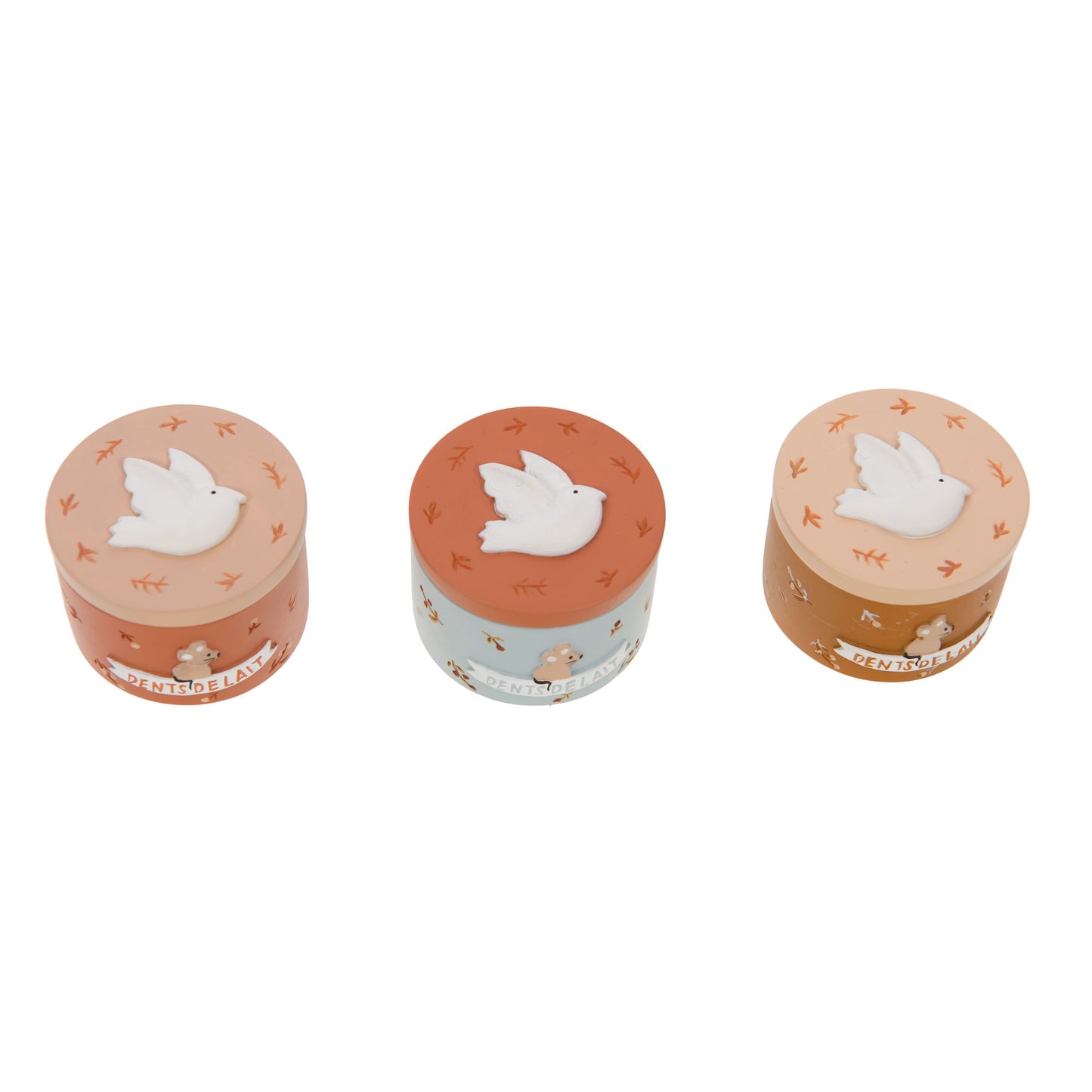 Trio de boîtes à dents colorées avec une colombe en relief sur le couvercle. 