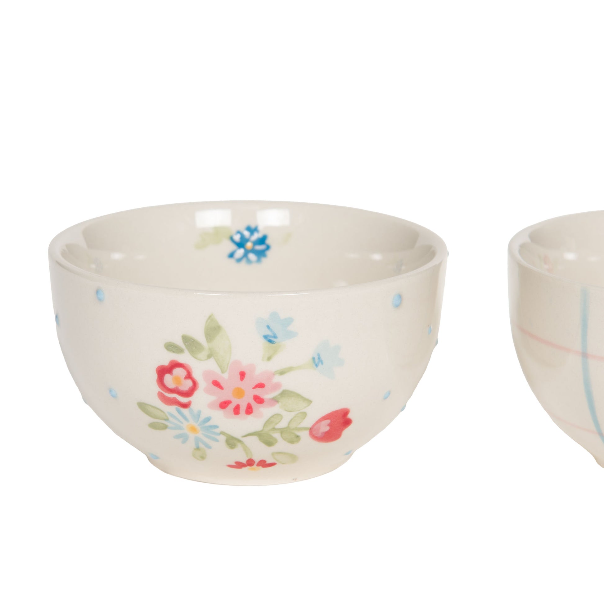 Bol en grès avec bouquet et motif à pois.