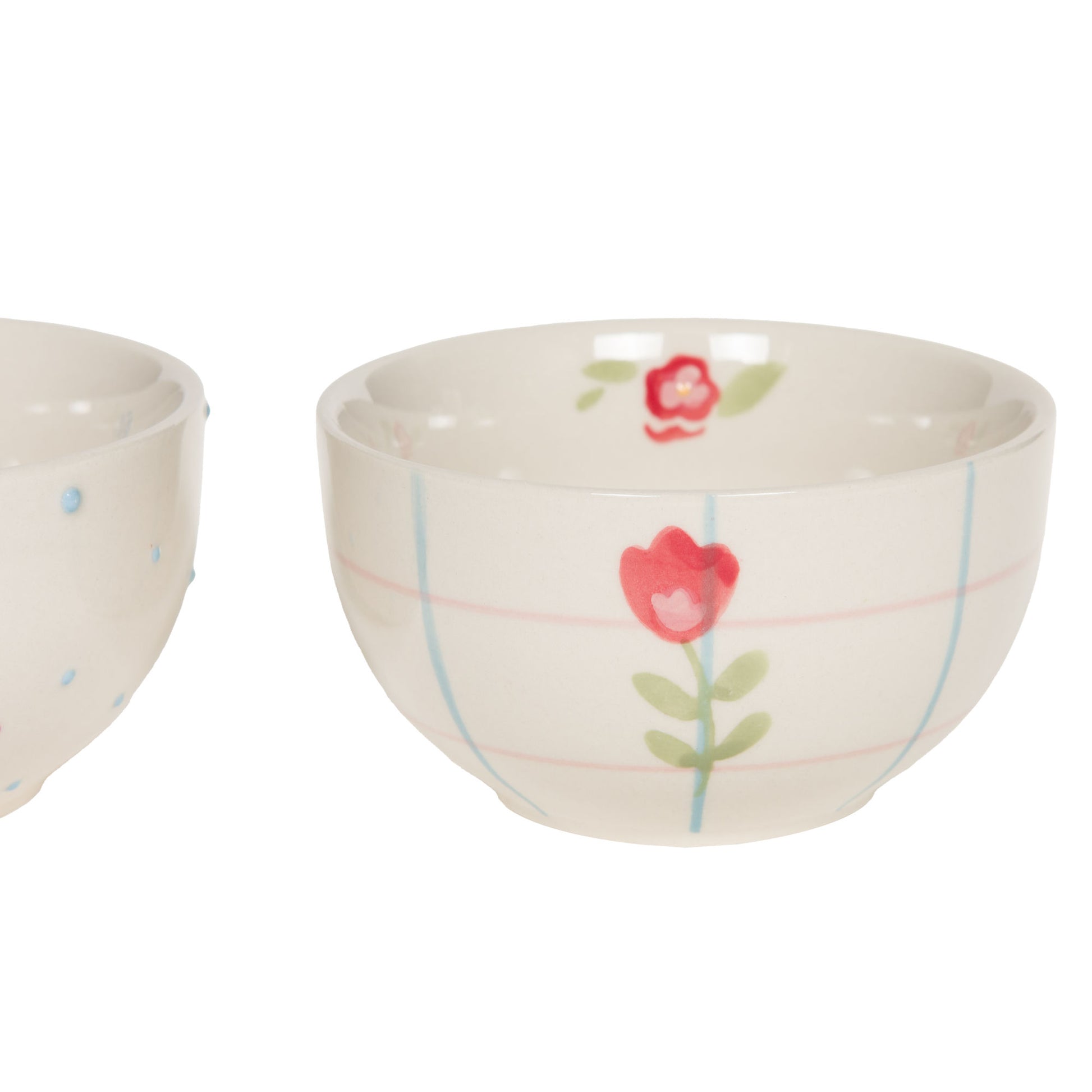 Bol en grès avec décor quadrillé et floral.