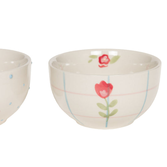 Bol en grès avec décor quadrillé et floral.