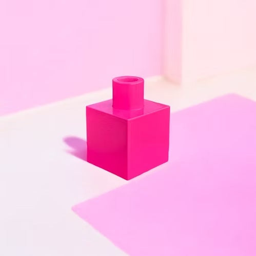 Bougeoir empilable cubique rose.