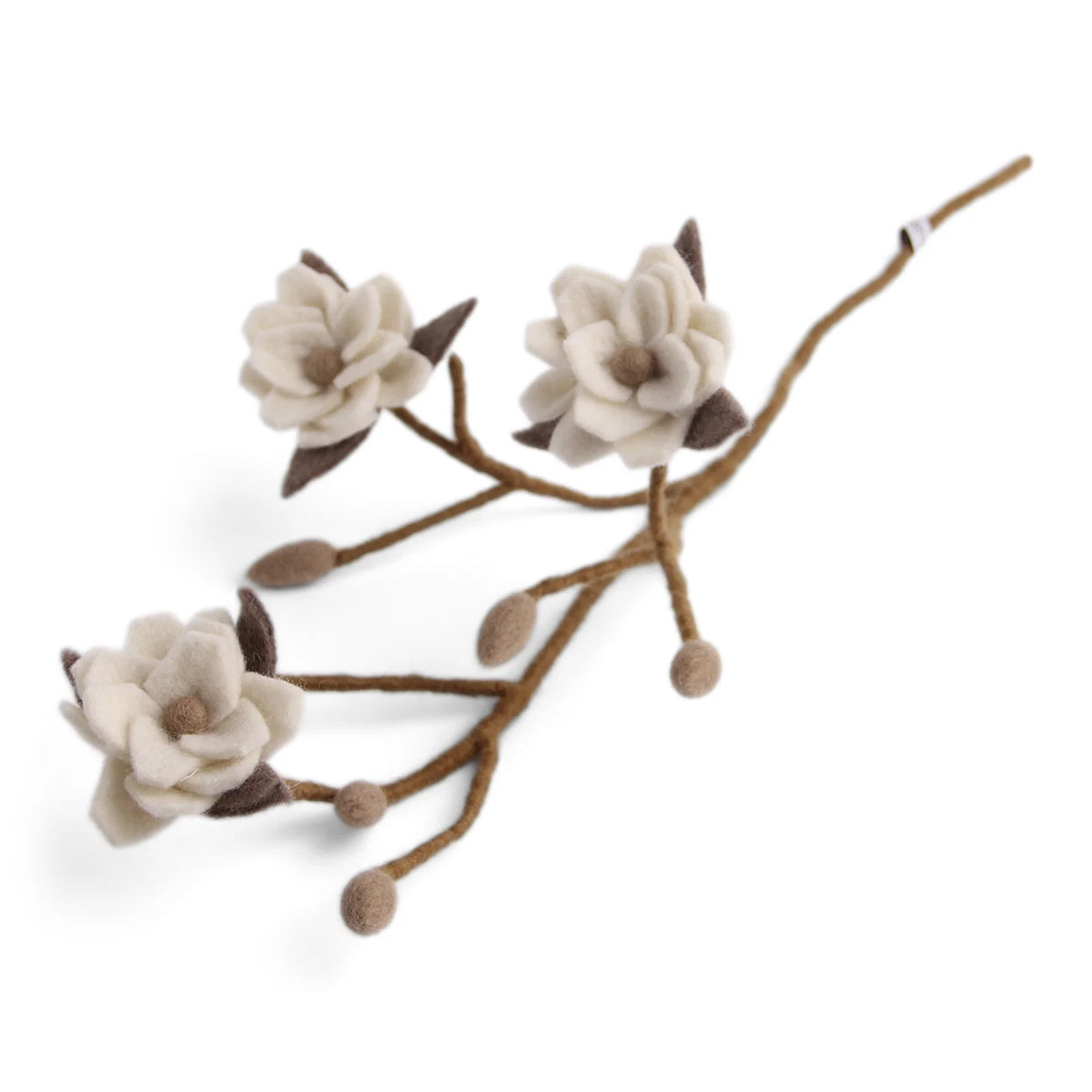 Branche avec fleurs blanches de magnolia en laine feutrée