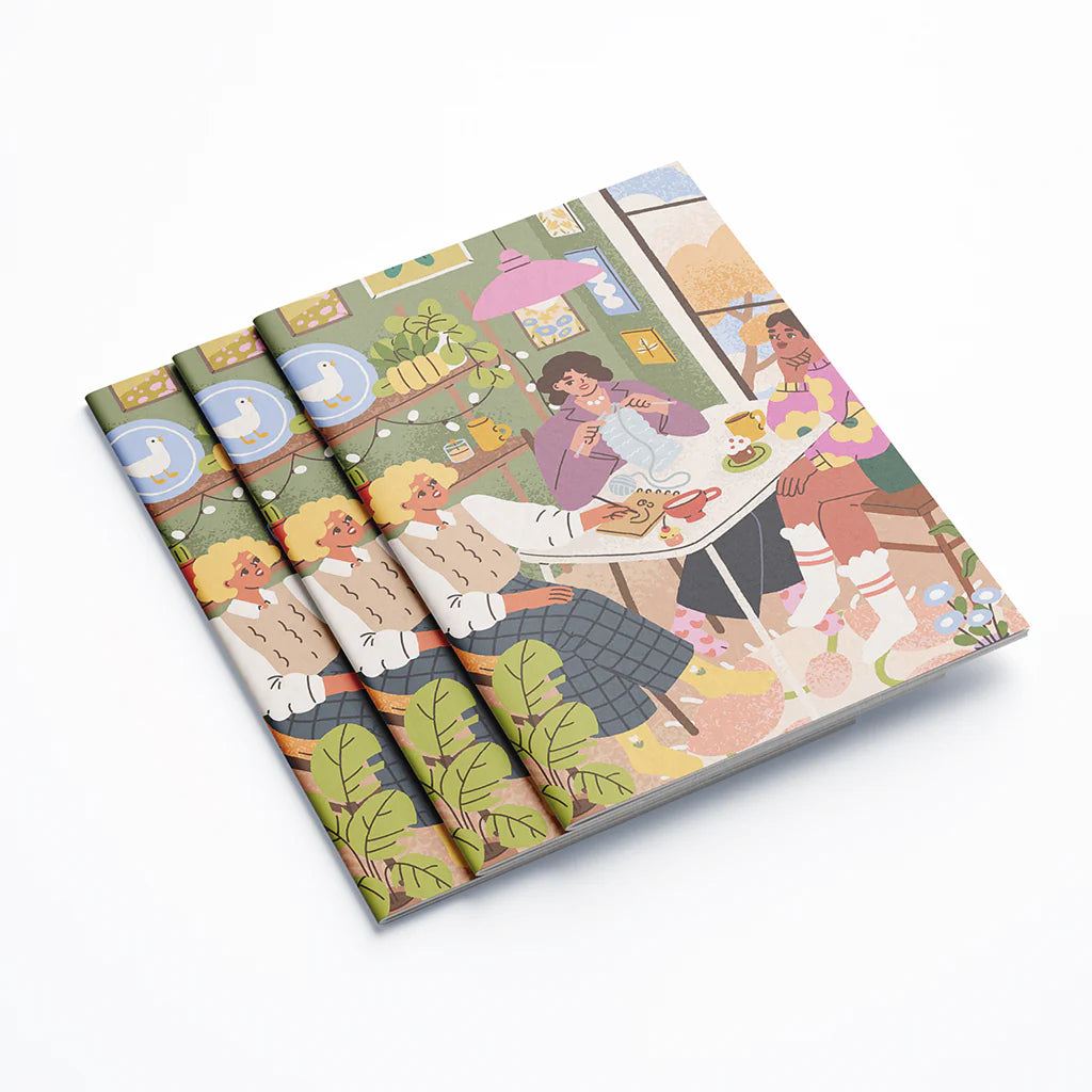 Carnet A5 avec des copines faisant des loisirs créatifs en couverture.