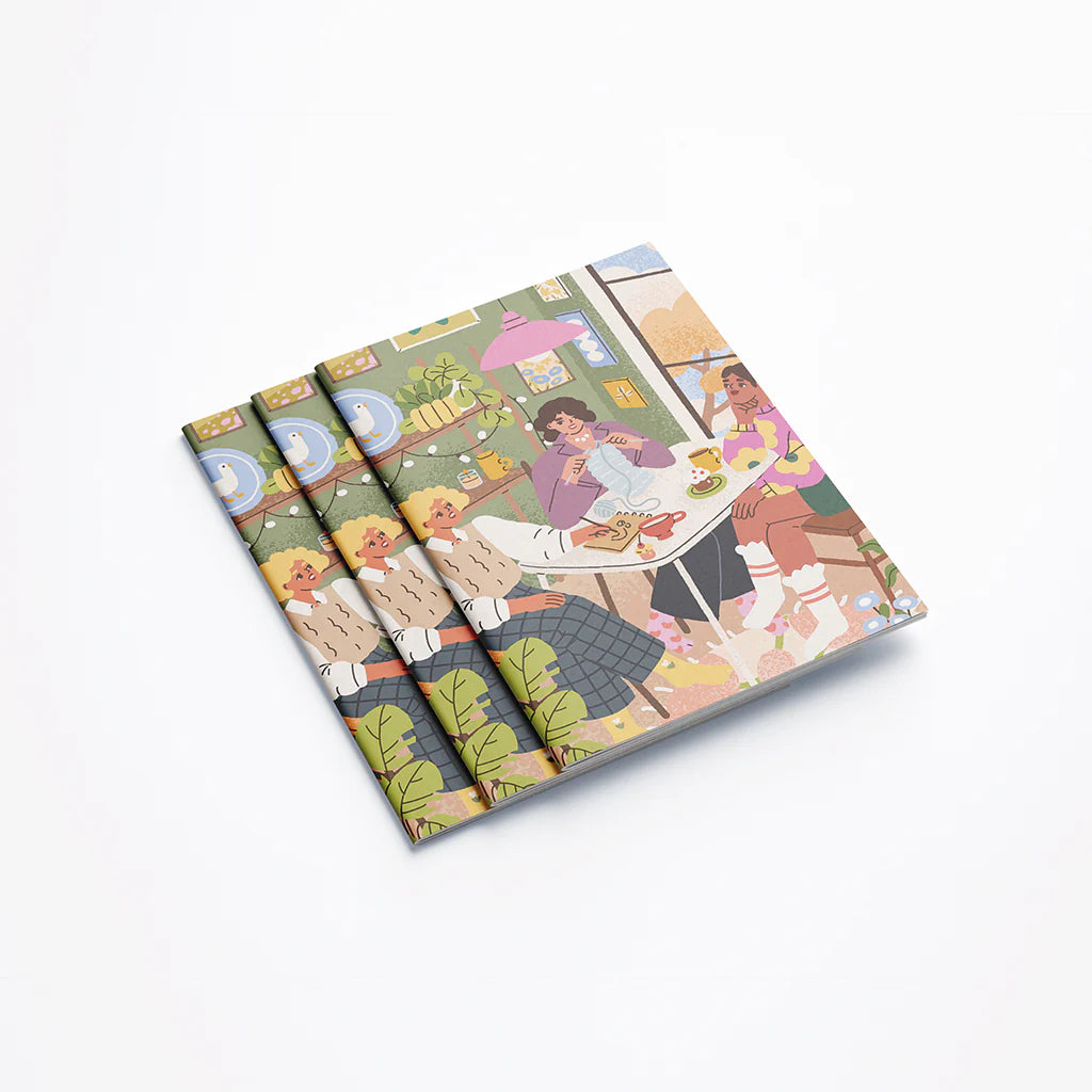 Carnet A6 avec des copines faisant des loisirs créatifs en couverture.
