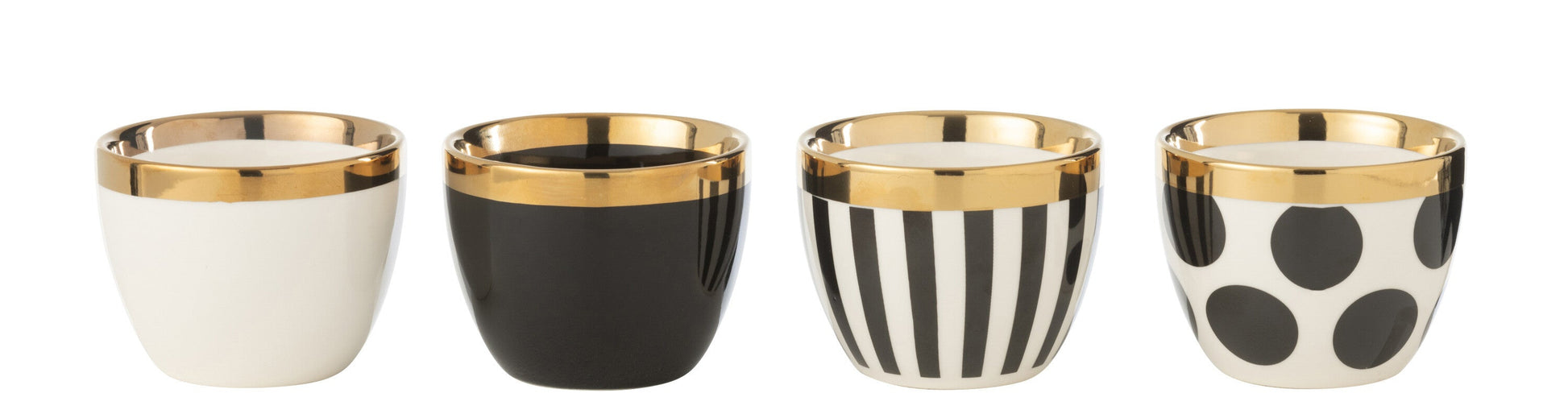 4 tasses avec différents motifs : 1 unie blanche, 1 unie noire, 1 rayée noir et blanc, 1 à pois noir sur fond blanc, l'ensemble avec une liseré doré. 
