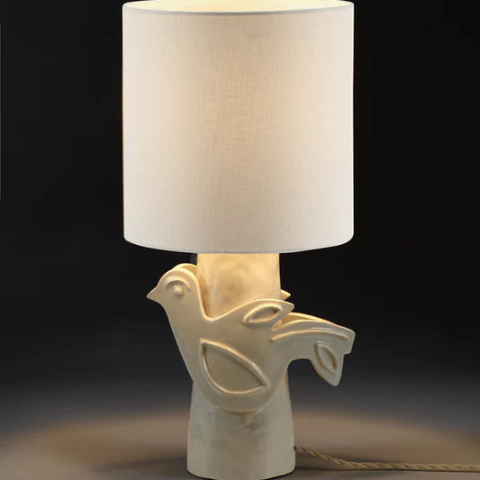 LAMPE A POSER BLANCHE AVEC UN OISEAU EN RELIEF SUR LE PIED SERAX