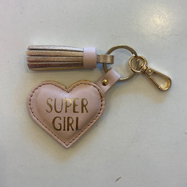 Porte clés en cuir trop funs avec un joli pompon