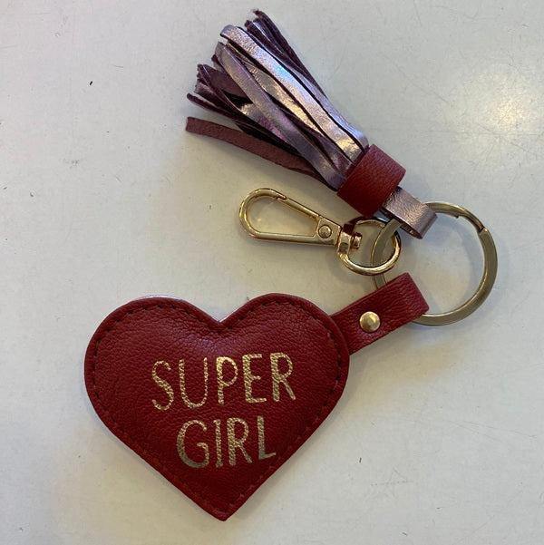 Porte clés en cuir trop funs avec un joli pompon