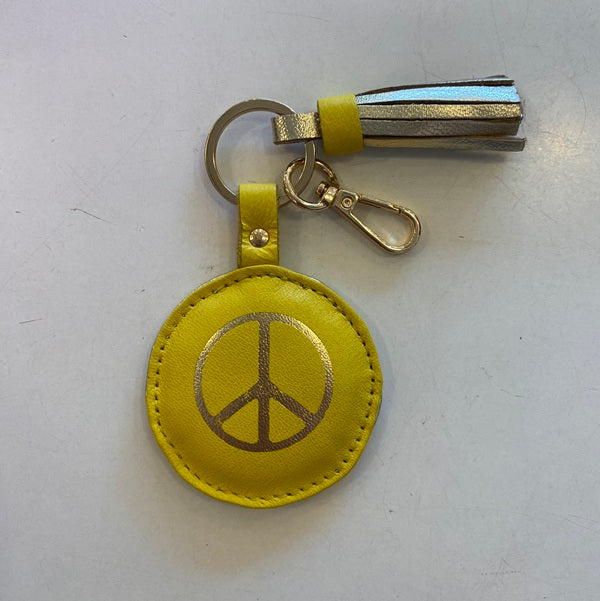 Porte clés en cuir trop funs avec un joli pompon