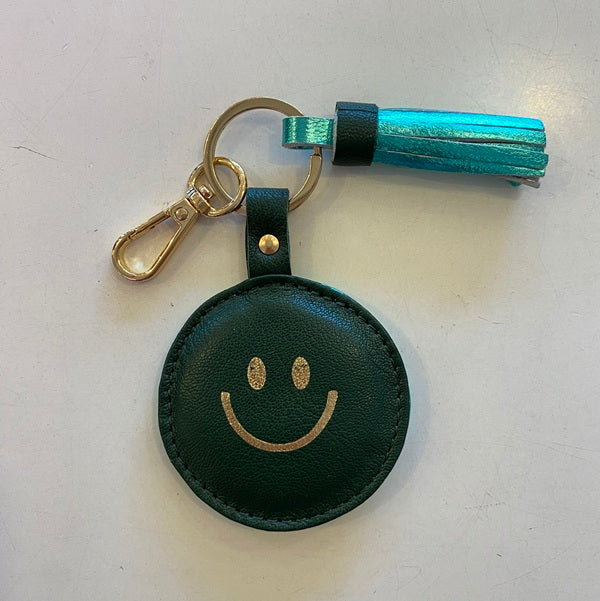 Porte clés en cuir trop funs avec un joli pompon