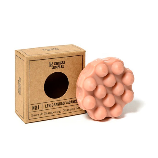 Shampoing solide massant, parfumLes Grandes Vacances, coloris rose.