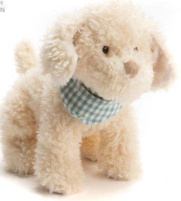 Peluche toute douce en forme de chien. 