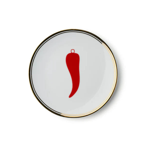 Petite assiette blanche Bitossi, dessin de piment en rouge avec bord doré.