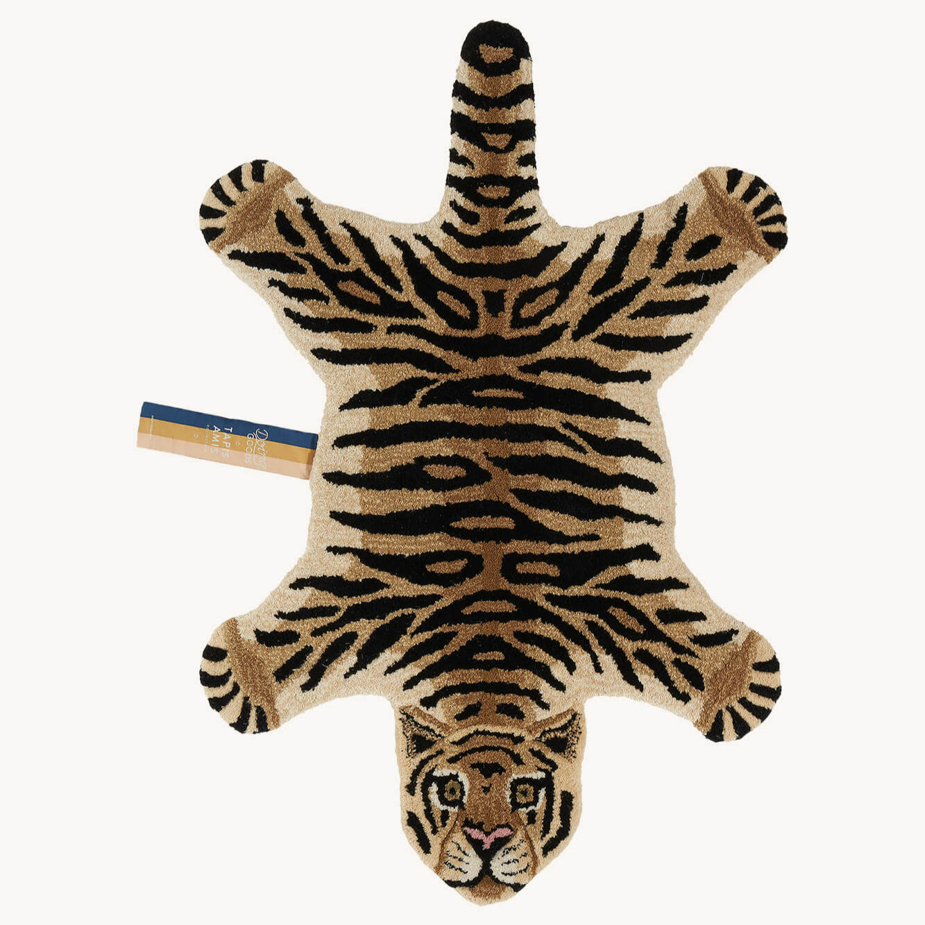 Petit tapis en laine en forme de tigre.