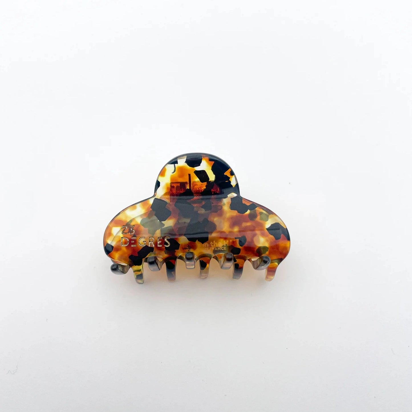 Petite pince à cheveux en forme de nuage à motifs écaille classique. 