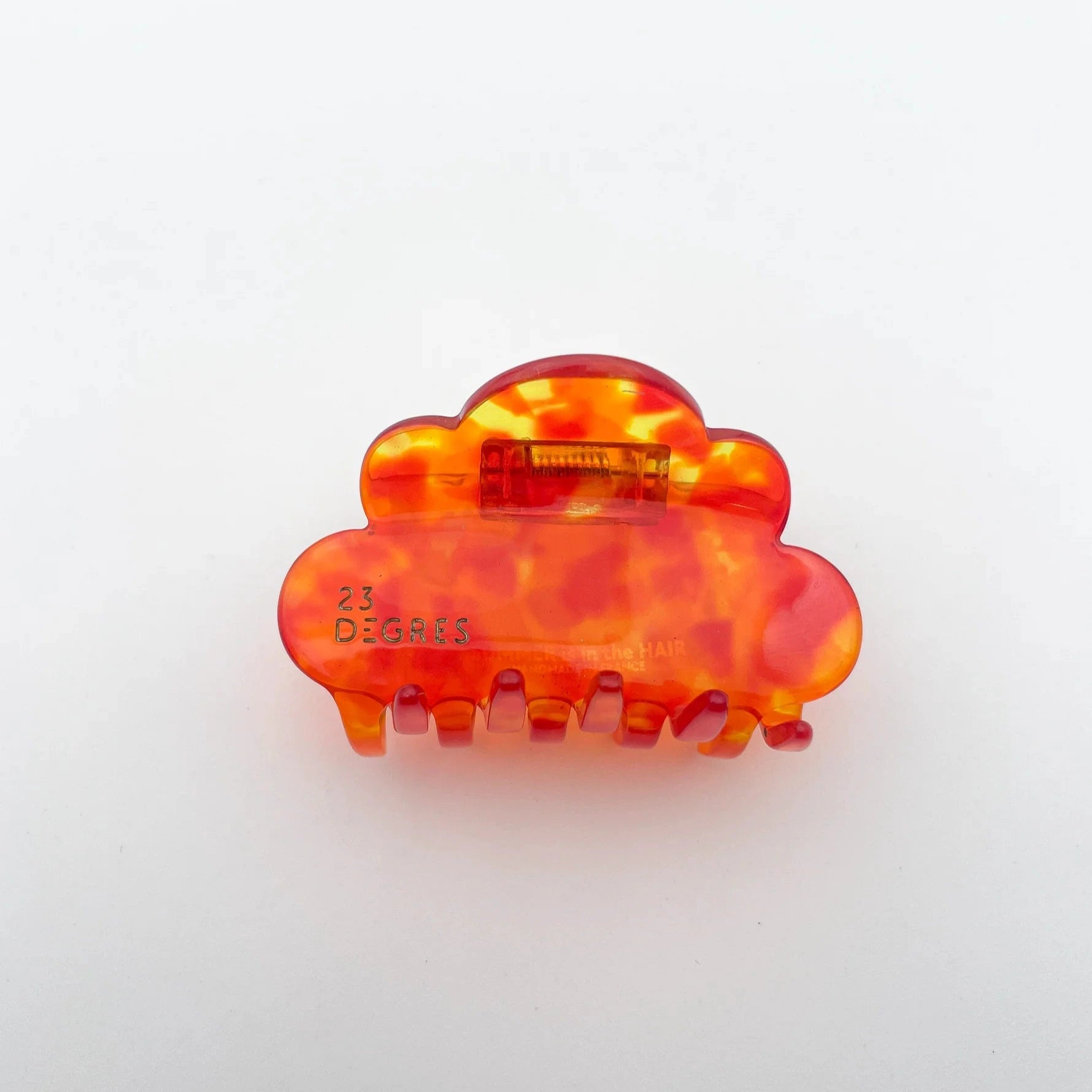 Pince à cheveux en acétate en forme de nuage, à motifs écaille, coloris orange.