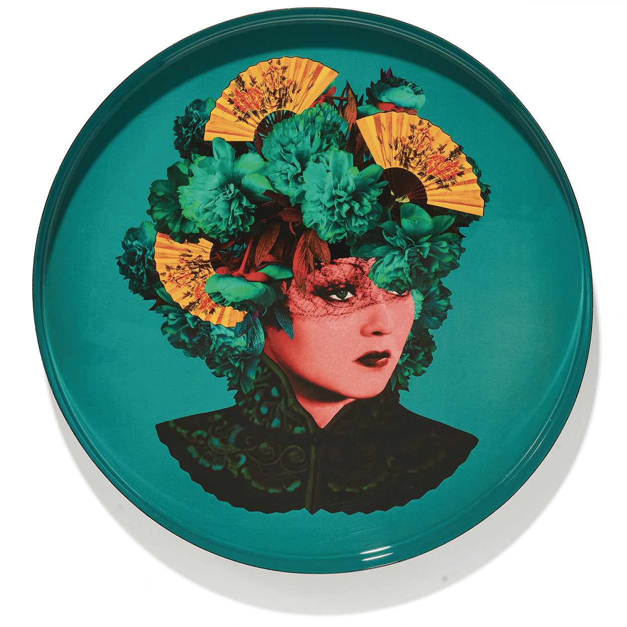 Plateau rond en métal, modèle Felicia, fond bleu turquoise. 