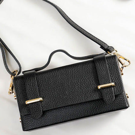 Sac en cuir de vachette grainé, coloris noir.