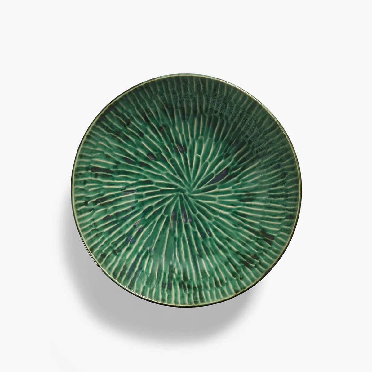 Saladier en grès vert, motif goujé.