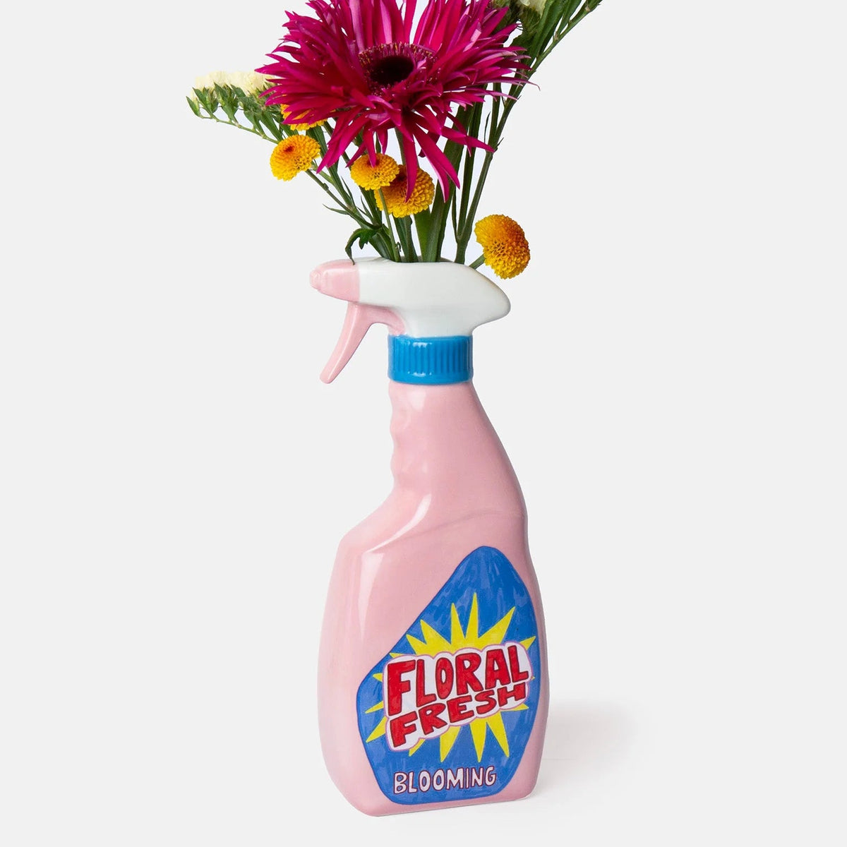 Vase en forme de spray nettoyant rose.