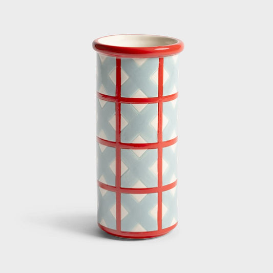 Vase en grès à motif croix, dans les couleurs rouge et bleu clair. 