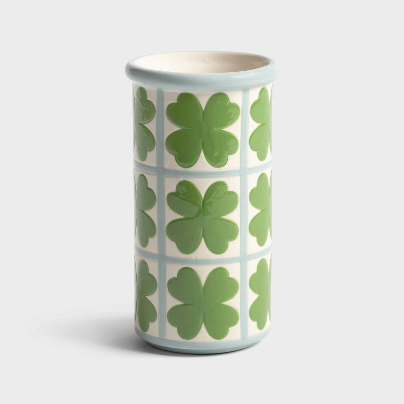 Vase en grès à motif trèfles, dans les couleurs vert et bleu clair. 
