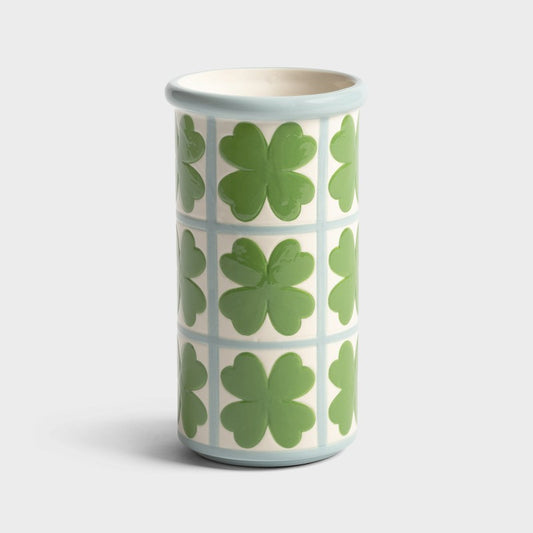 Vase en grès à motif trèfles, dans les couleurs vert et bleu clair. 