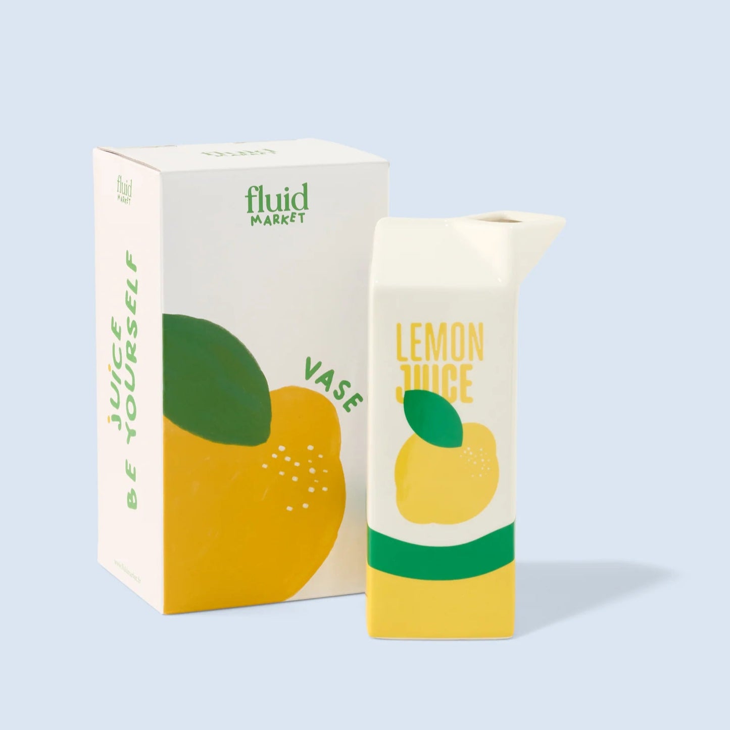 Vase en céramique en forme de brique de jus de citron.