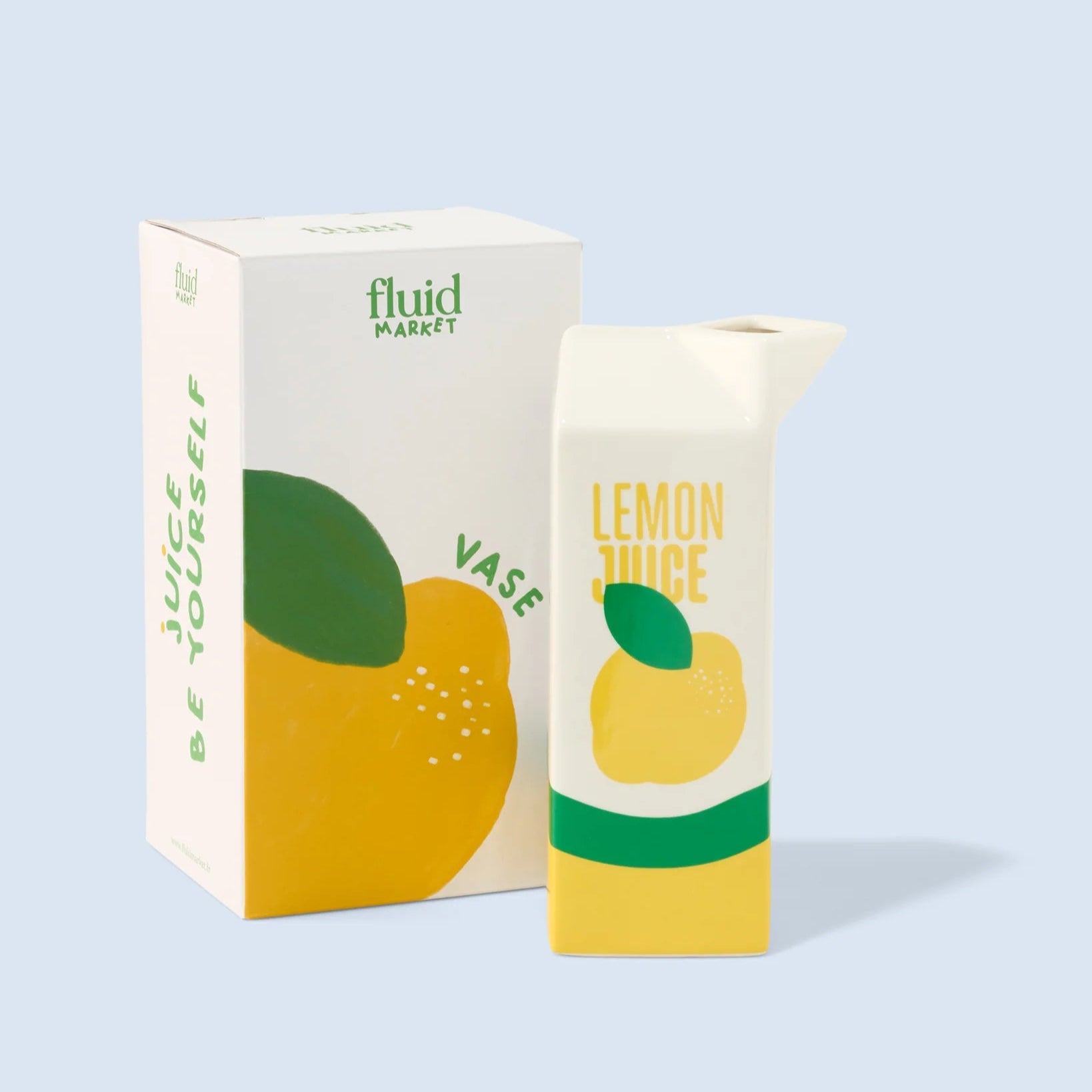 Vase en céramique en forme de brique de jus de citron.